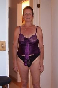an senior woman has her highly hairy poon and is riding up the stairs