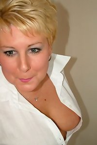 a wonderful blonde chick wearing heels and pantyhose